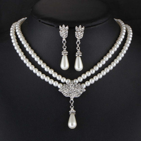 Cultured Freshwater Pearl Necklace and Earring Set in sterling silver.